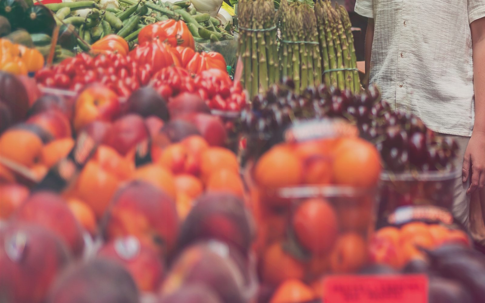 Muted local market detail used as WebInk service texture